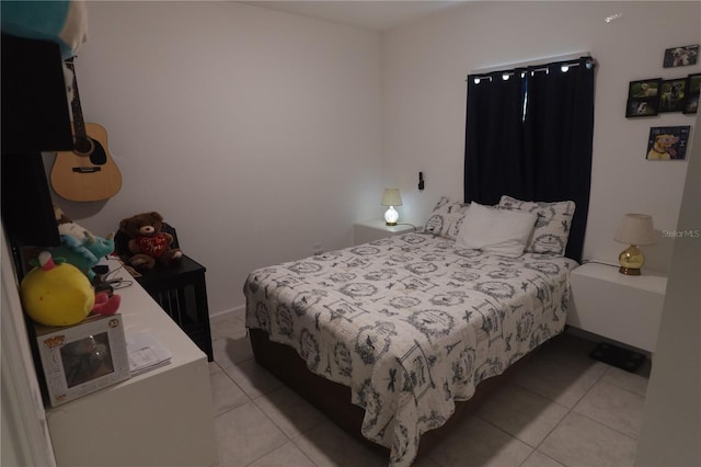 bedroom with light tile patterned flooring