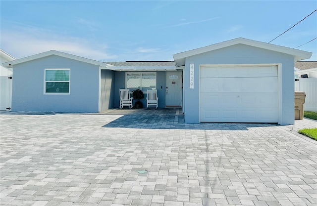 ranch-style house with a garage