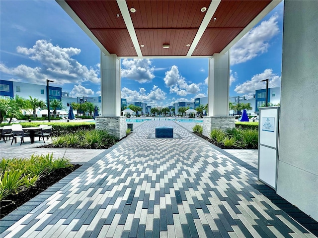 view of patio with a community pool