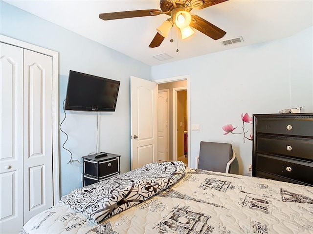 bedroom with a ceiling fan, a closet, and visible vents