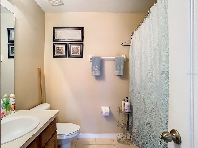 full bathroom featuring visible vents, toilet, vanity, tile patterned flooring, and baseboards