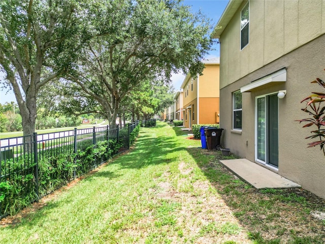 view of yard featuring fence