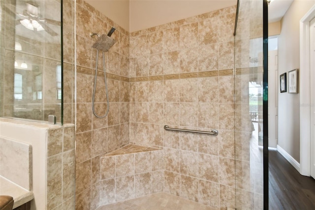 bathroom with a tile shower