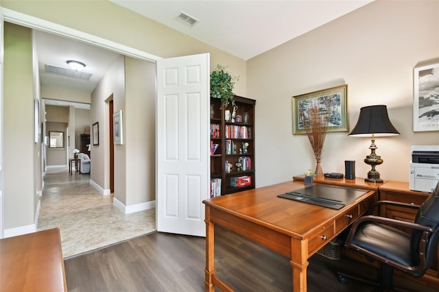 home office featuring dark wood-type flooring