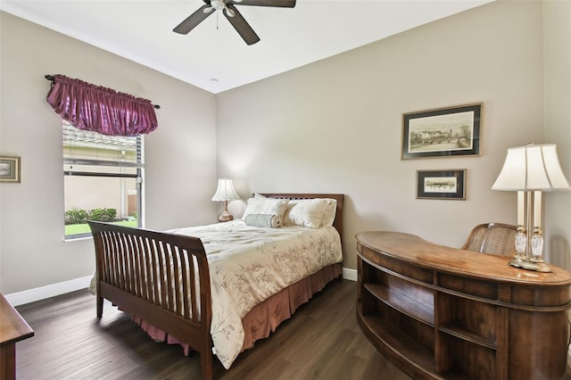 bedroom featuring dark hardwood / wood-style floors and ceiling fan