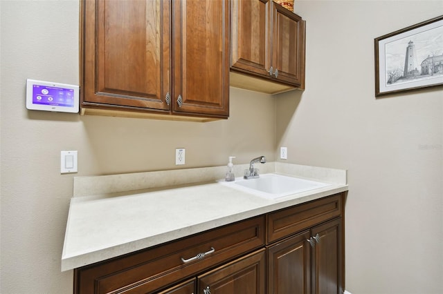 laundry room featuring sink