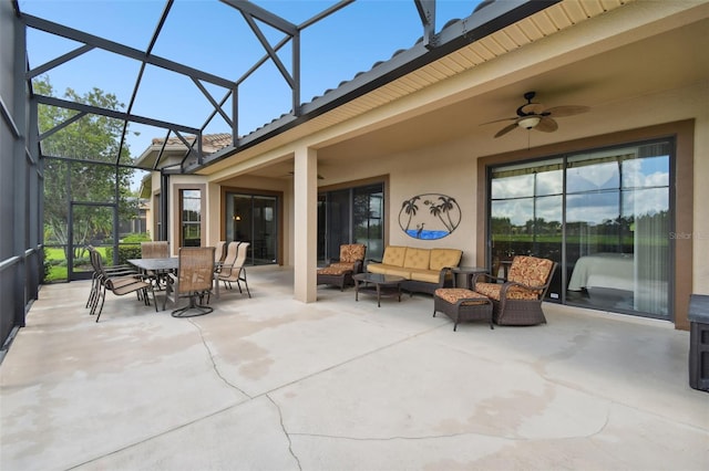 view of patio featuring ceiling fan, outdoor lounge area, and a lanai