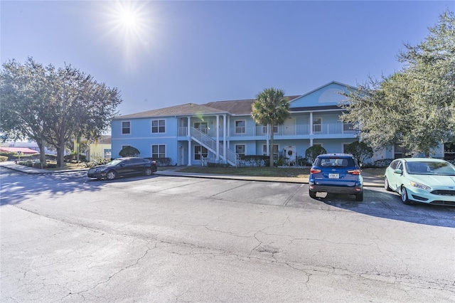 view of front of house with a balcony