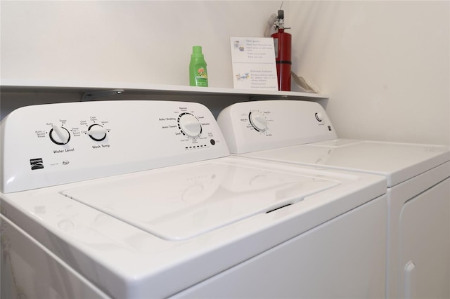 laundry area featuring washing machine and dryer