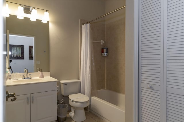 full bathroom featuring vanity, tile patterned floors, shower / bath combo with shower curtain, and toilet