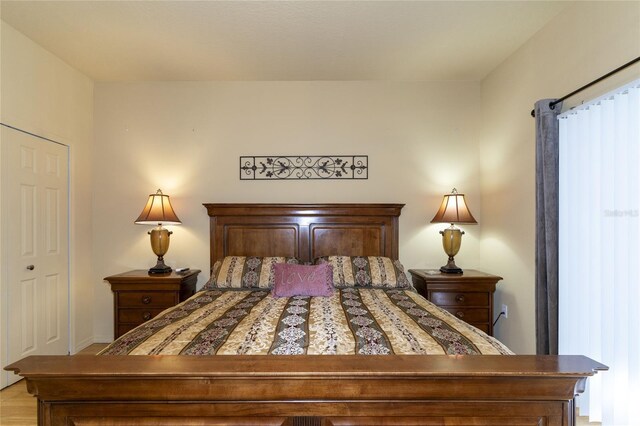 bedroom with light hardwood / wood-style flooring