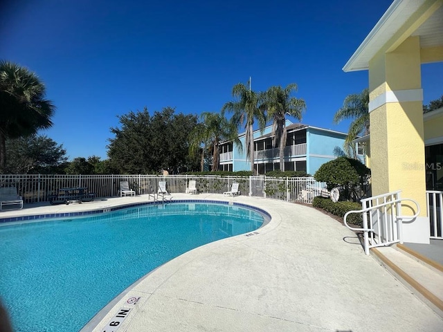 view of swimming pool featuring a patio