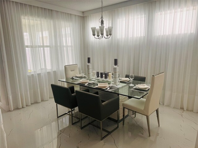 dining room featuring an inviting chandelier