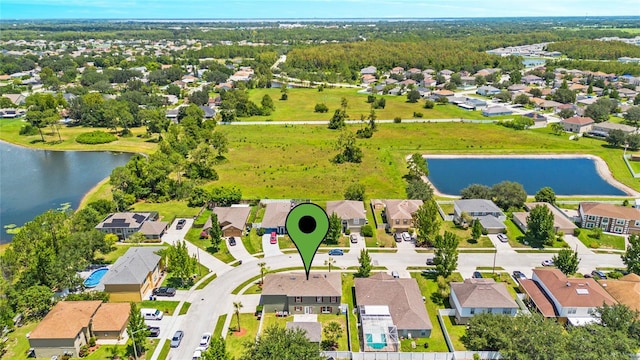 drone / aerial view featuring a water view