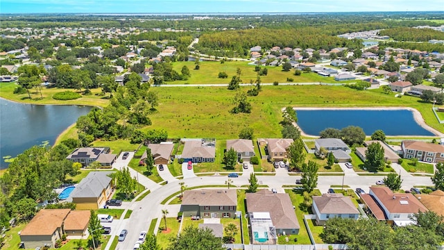 drone / aerial view with a water view