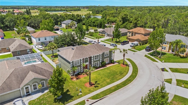 5051 Plymouth Turtle Cir, Saint Cloud, FL 34772 - aerial view of residential area with a heavily wooded area