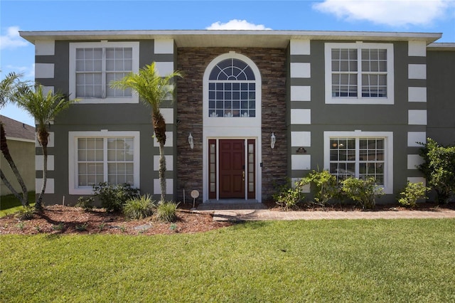 view of front of house with a front lawn