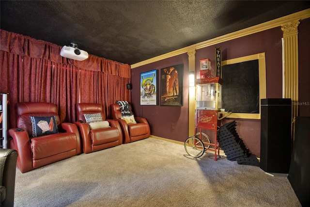 carpeted cinema room with a textured ceiling and crown molding