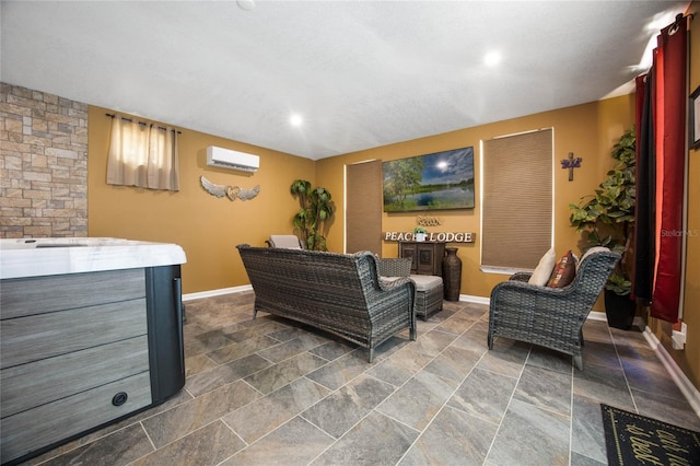 living room featuring a wall mounted AC