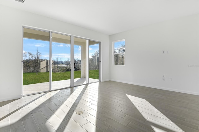 empty room featuring hardwood / wood-style floors