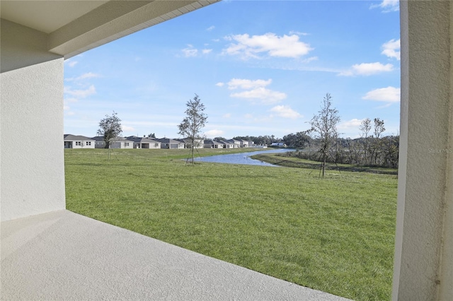 view of yard with a water view