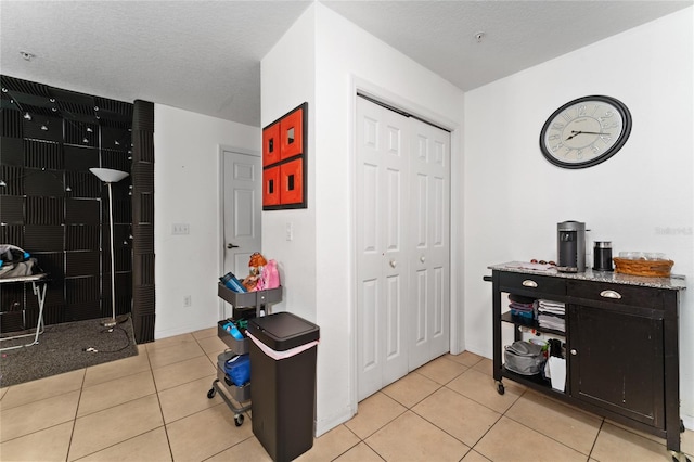 interior space featuring light tile patterned floors