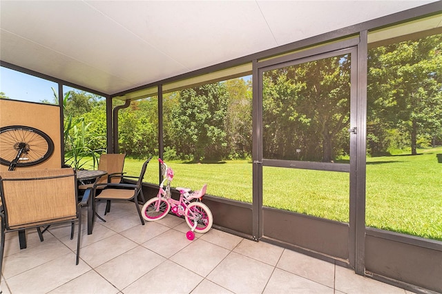 unfurnished sunroom with a wealth of natural light