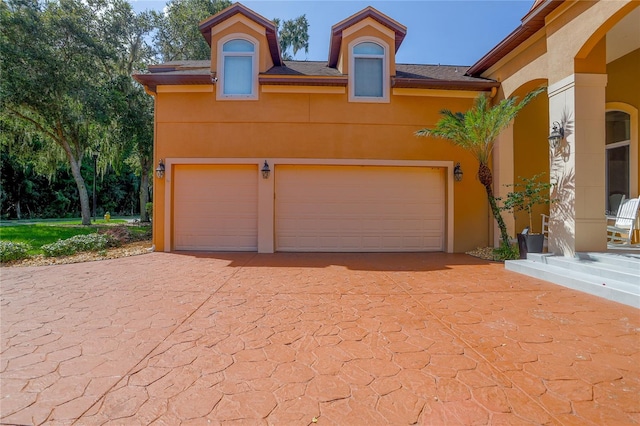 view of front of property featuring a garage