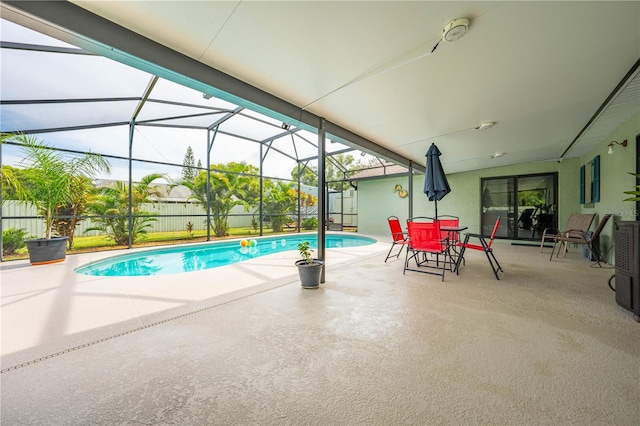 view of pool featuring a patio and a lanai