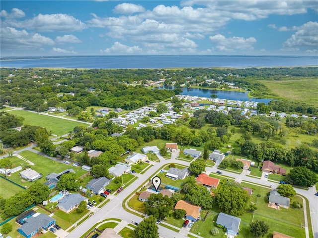 bird's eye view with a water view