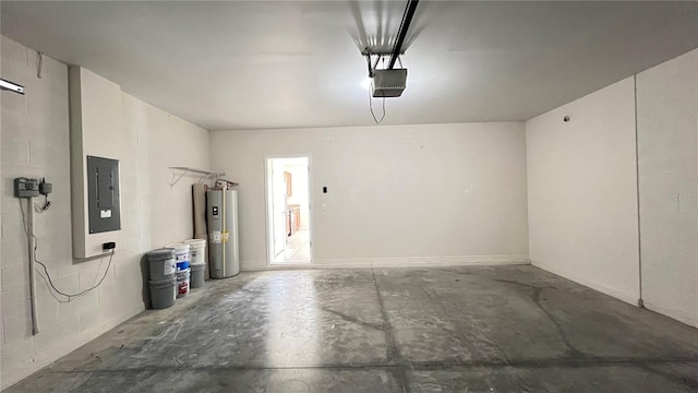 garage featuring electric panel, water heater, and a garage door opener