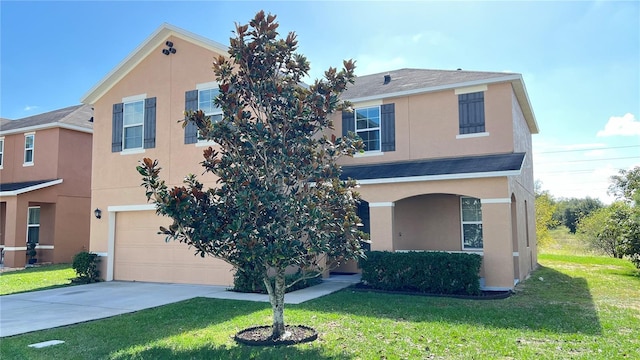 front facade with a front lawn and a garage