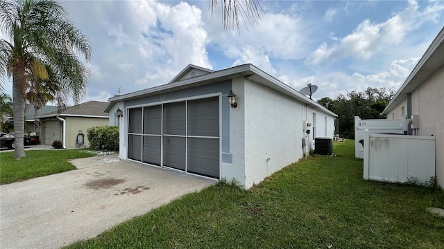 view of property exterior with a lawn, central AC unit, and a garage