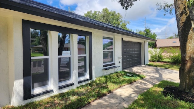 view of home's exterior with a garage