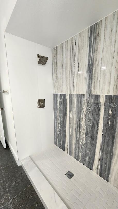 bathroom featuring walk in shower