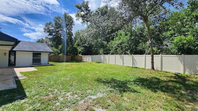 view of yard with a patio area