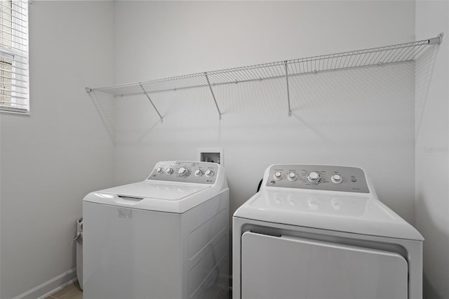 washroom with washer and clothes dryer