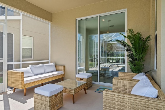 balcony featuring an outdoor hangout area and a patio