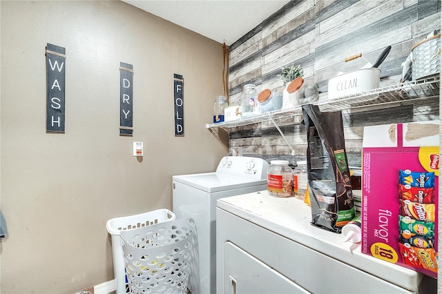 laundry area with washing machine and dryer