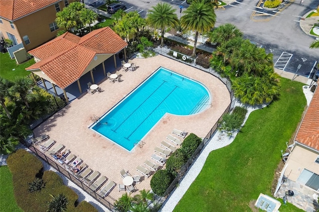 view of swimming pool with a patio area