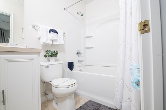 bathroom with tile patterned floors, toilet, and shower / bath combo