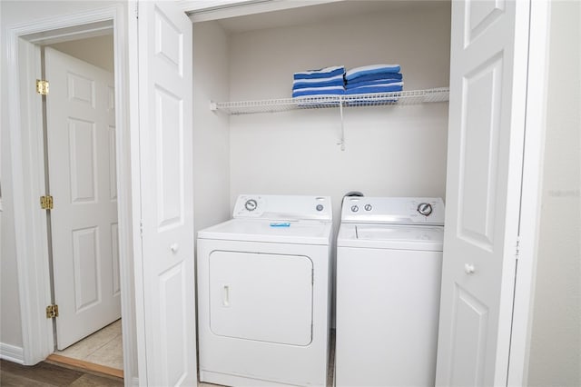 laundry area with washer and dryer