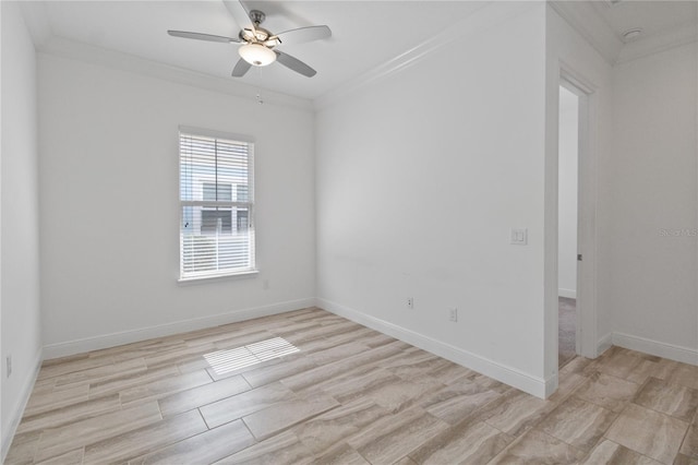 empty room featuring crown molding, light hardwood / wood-style flooring, and ceiling fan