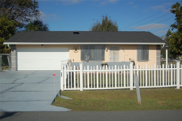 single story home with a garage