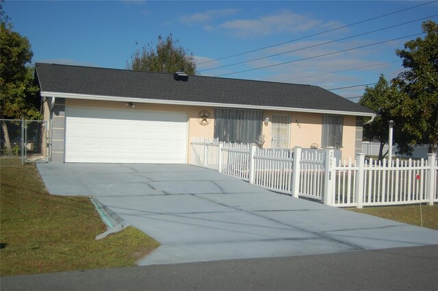 single story home with a garage