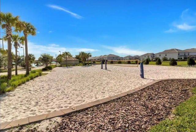 view of home's community with volleyball court