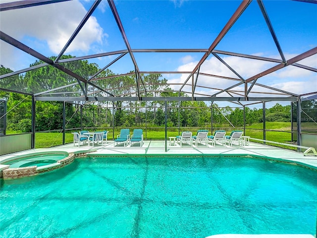 view of swimming pool featuring glass enclosure, an in ground hot tub, and a patio