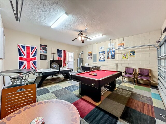 playroom featuring a textured ceiling, ceiling fan, electric panel, and pool table