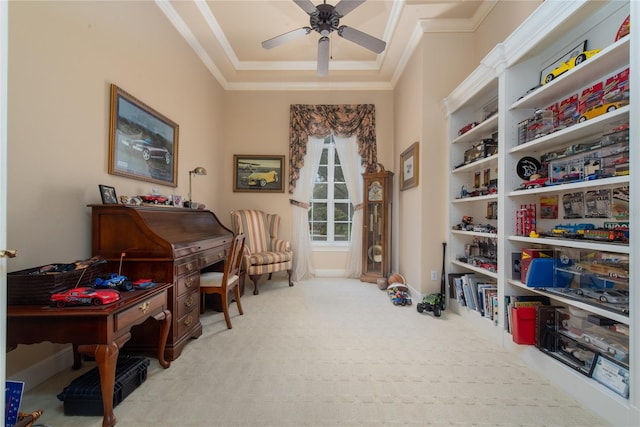 interior space with ornamental molding, light colored carpet, and ceiling fan