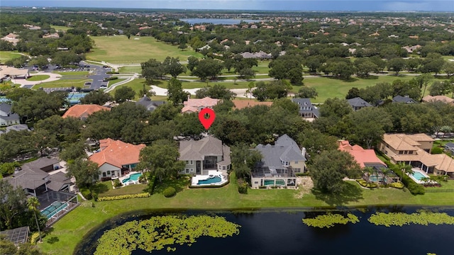 birds eye view of property featuring a water view and a residential view